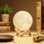 3D LED Lighting Real Moon Surface Re-Chargeable Wireless Lamp with Wooden Stand